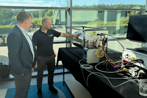Dave Tipping, Director of Global Operations, KidsOR demonstrates the NASA/AmOx/Public Invention Oxygen Generator to David Rennie, CEO of Global Hospital.